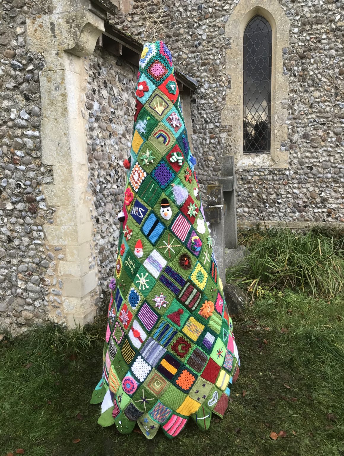 Grandmother knits Christmas tree over 6 feet tall made out of 200
